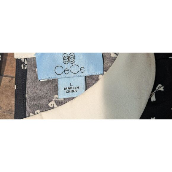 CeCe L Black White Bow Print Sleeveless Top - Picture 2 of 4